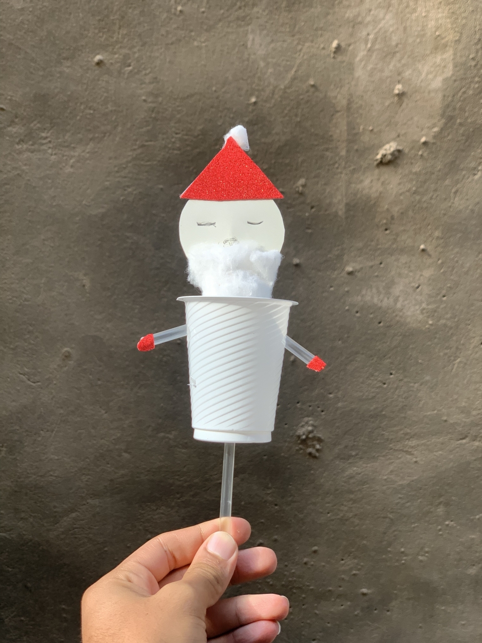 Turning used plastic cup into a Santa claus to be a play for the kids 