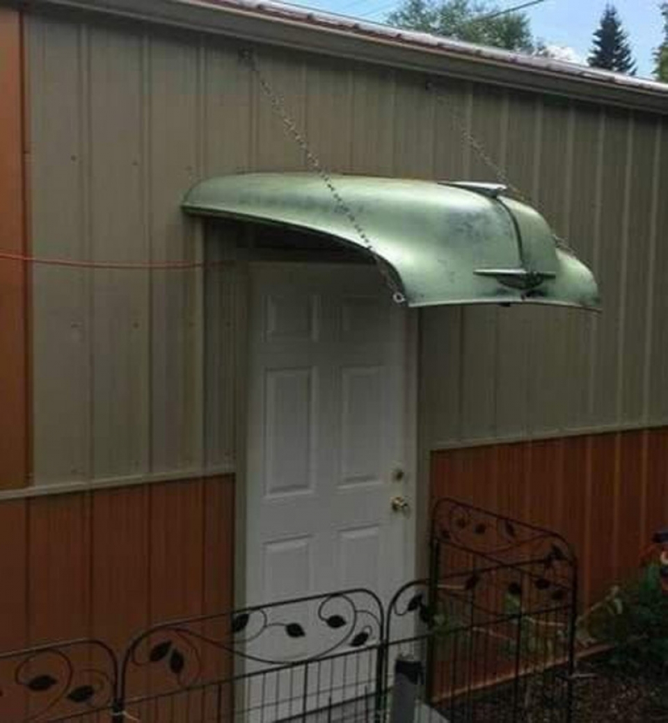 Overhang over the front door from an old truck cover