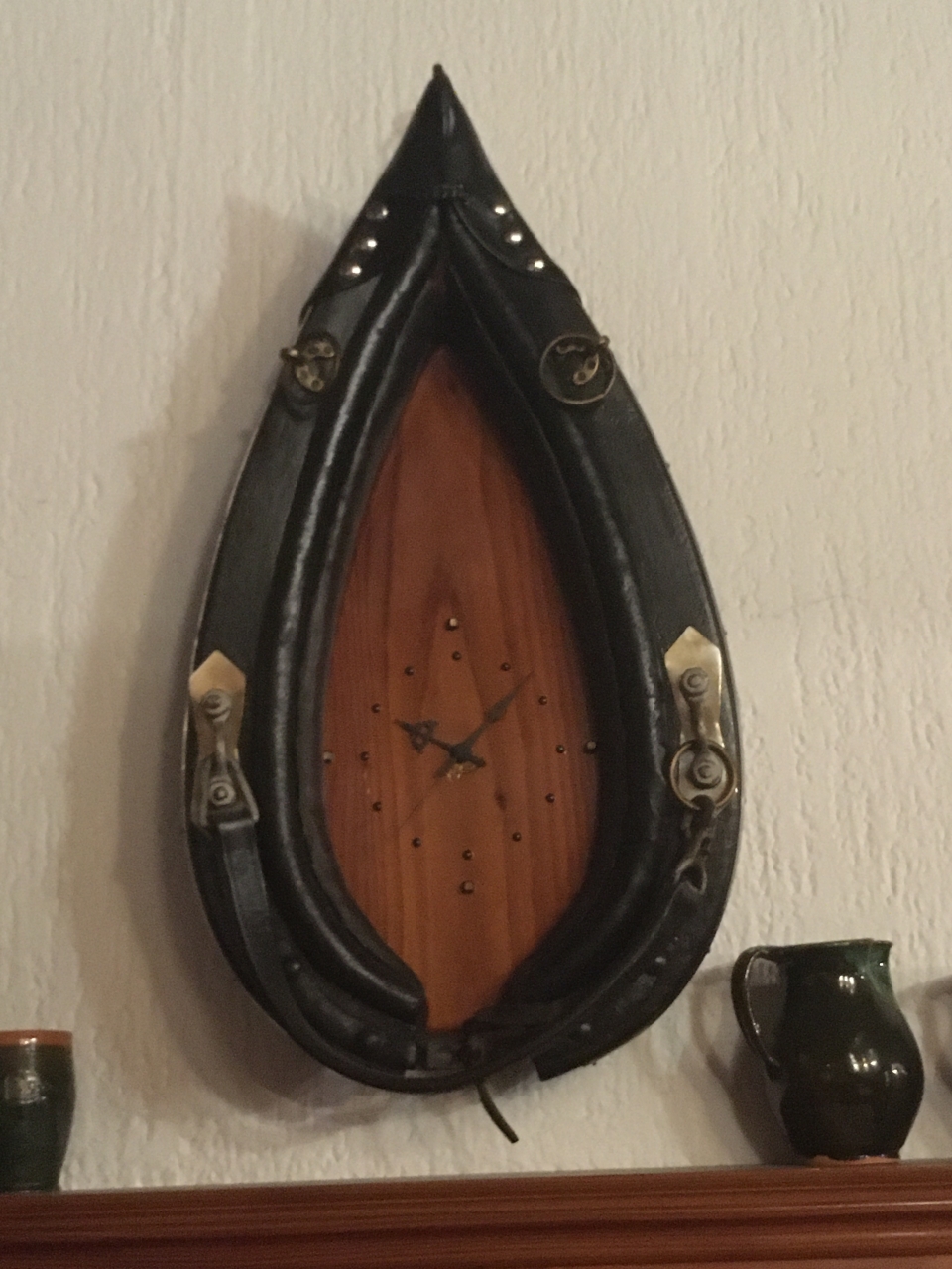 A clock made of an old horse harness