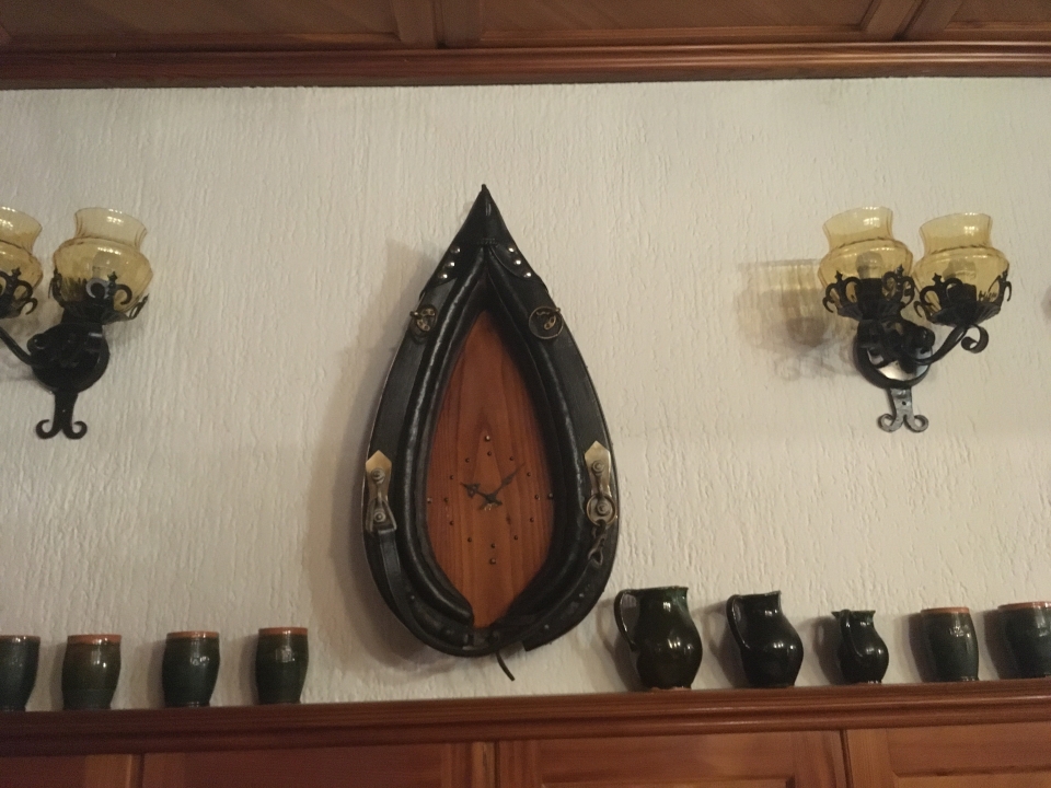 A clock made of an old horse harness