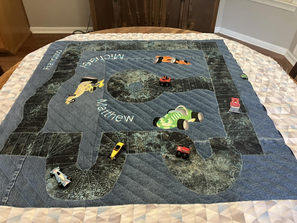A fun race track quilt for friends who travel