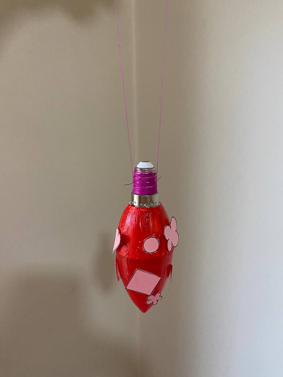 A decorative ornament made from a light bulb